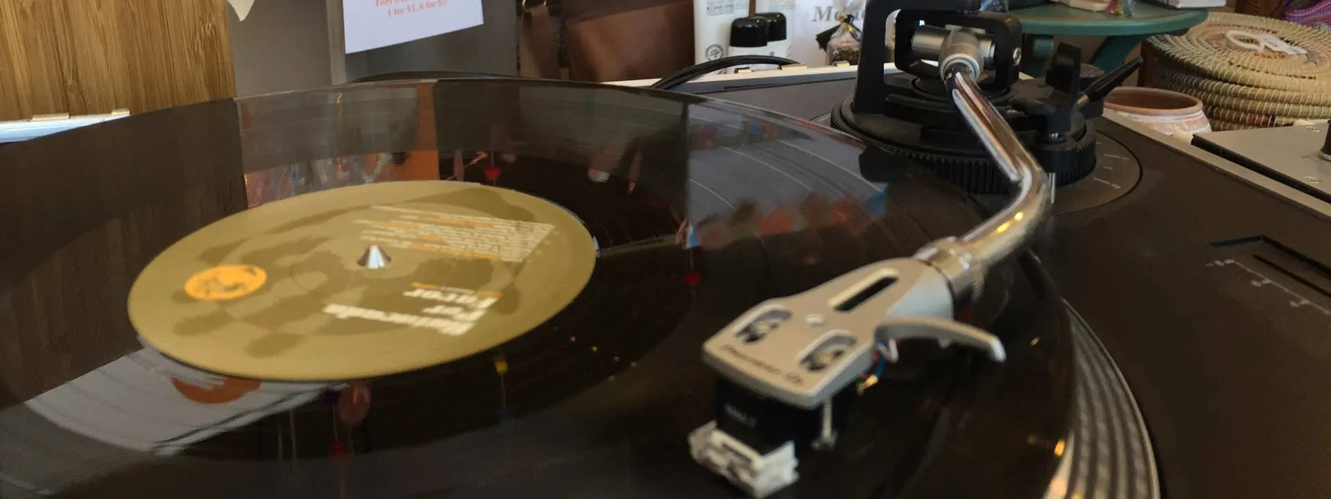 Vinyl record spinning on a DJ turntable